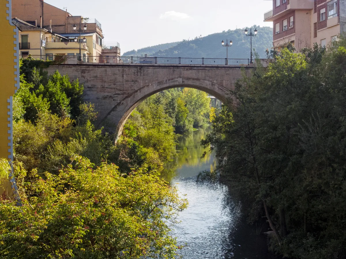 View of the Sil river passing through Ponferrada near the Castle