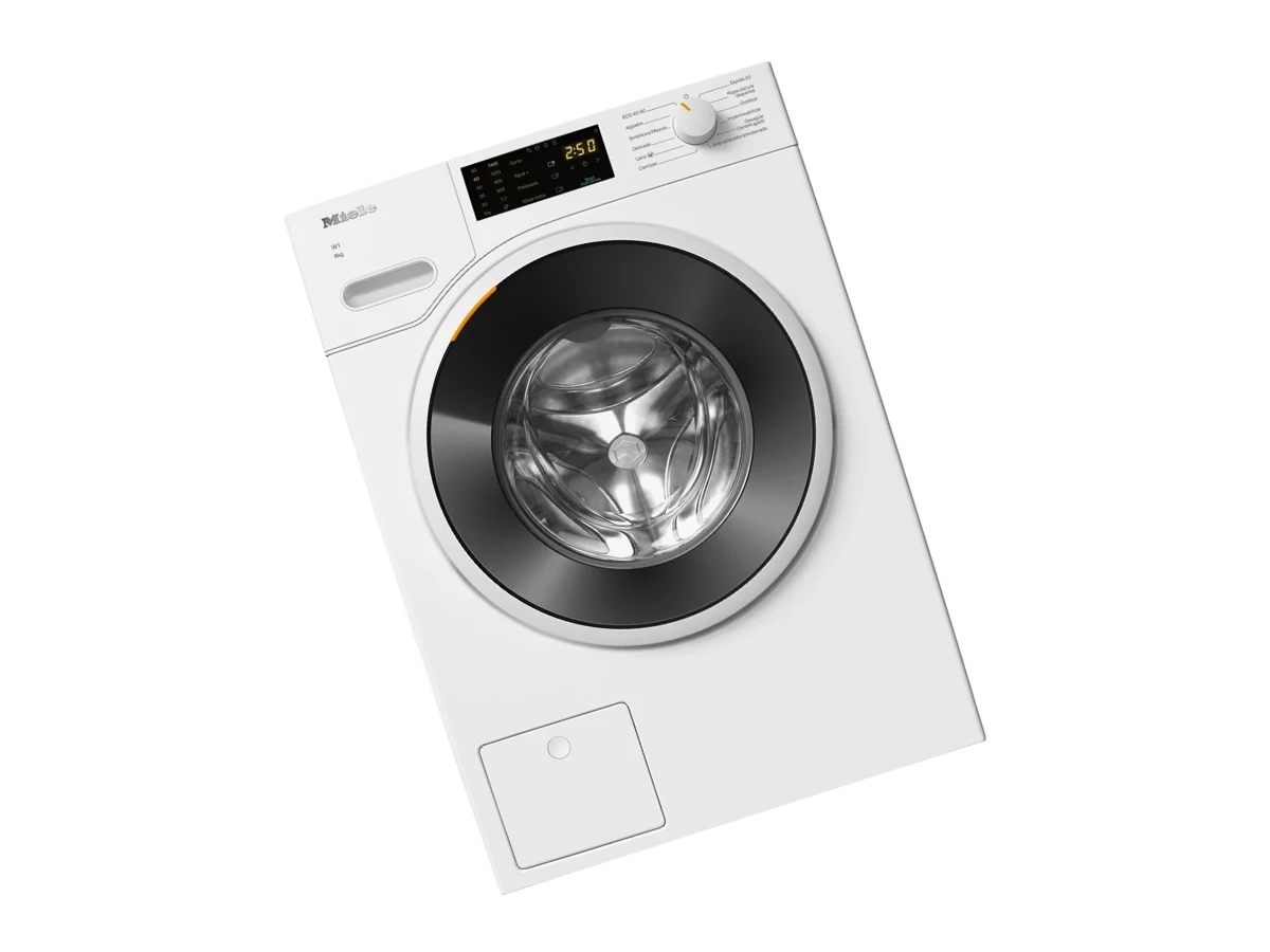 Técnico revisando lavadora Miele TwinDos